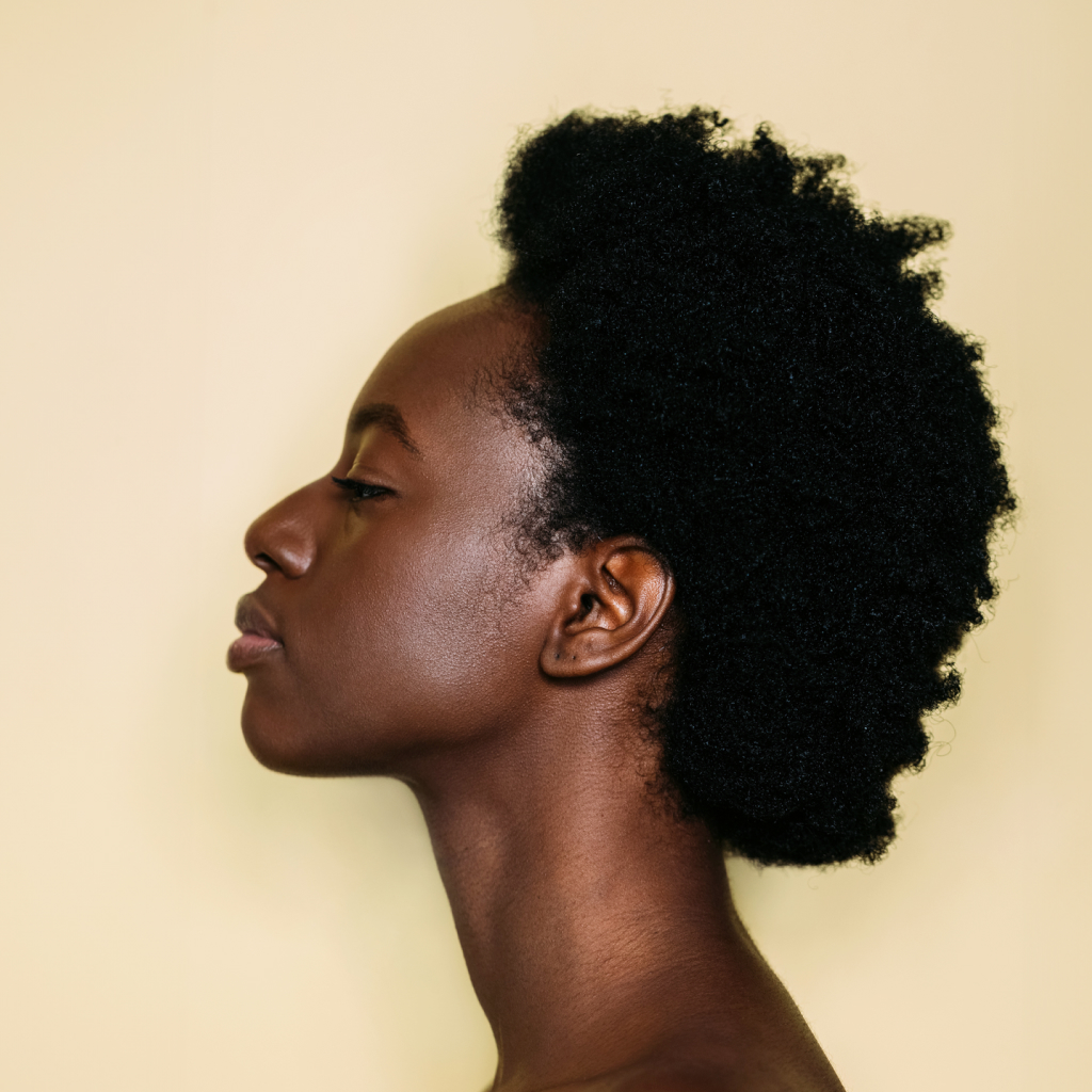 side profile of women with curly hair