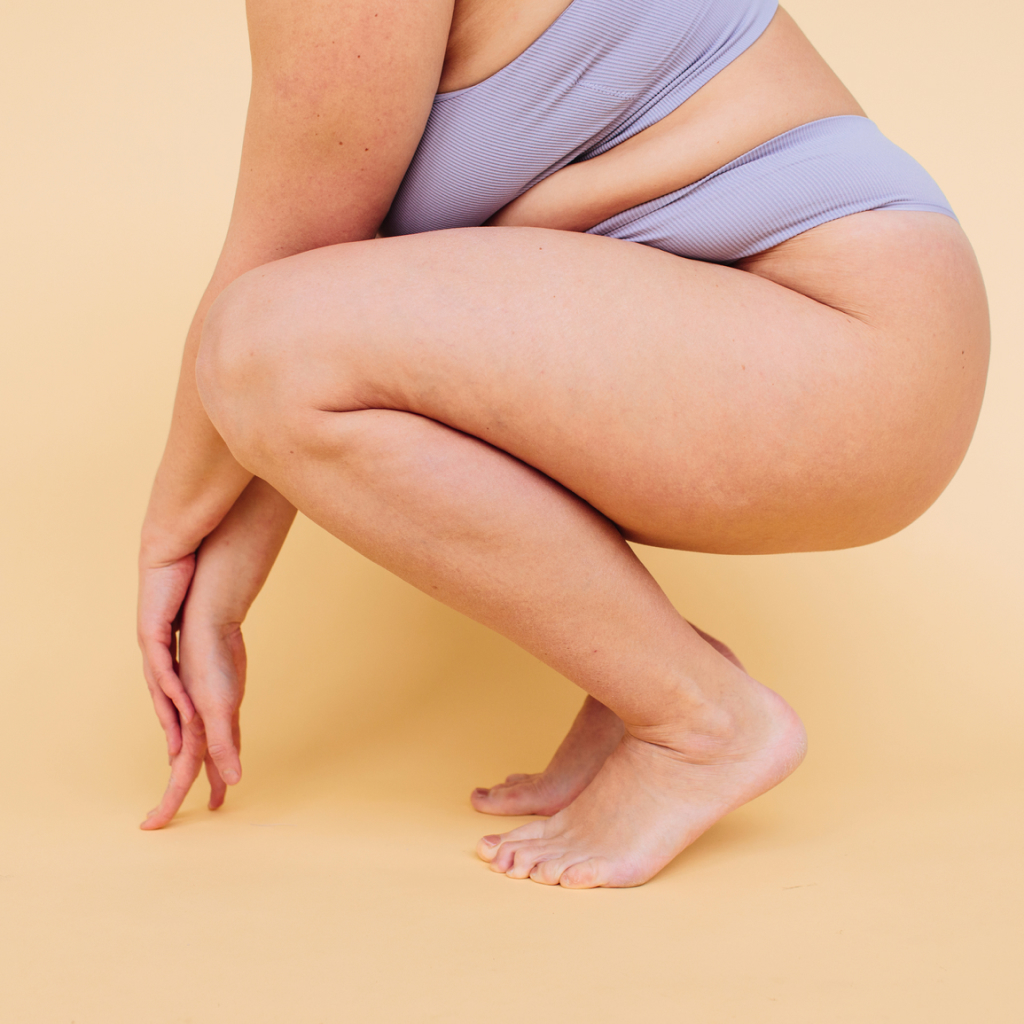 women with heavy legs squatting
